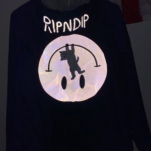 Ripndip reflective smiley face windbreaker